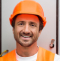 A young boy wearing a hard hat